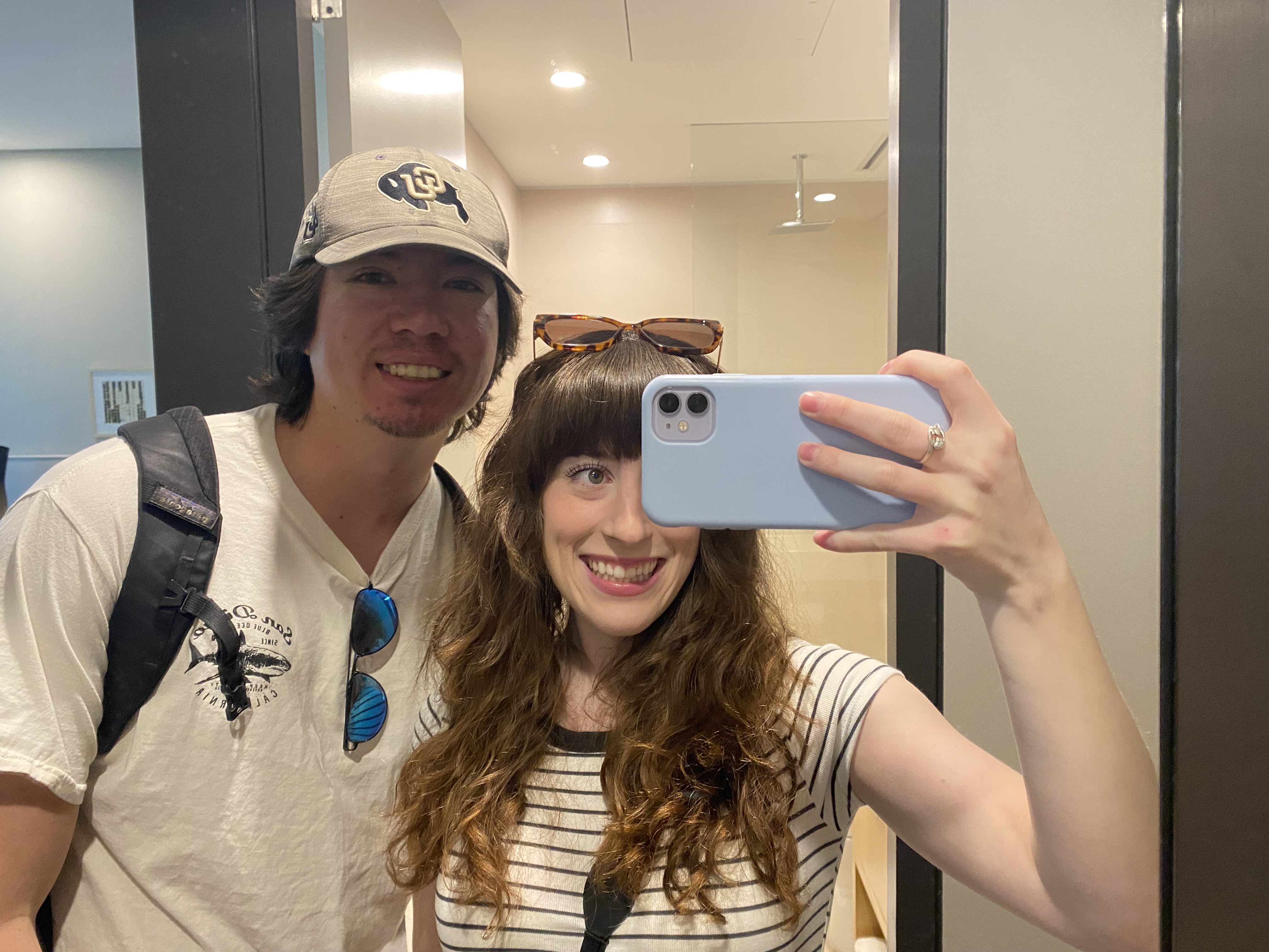 Bella and her handsome boyfriend, Sean, posing for a mirror selfie in a hotel room in Sydney.