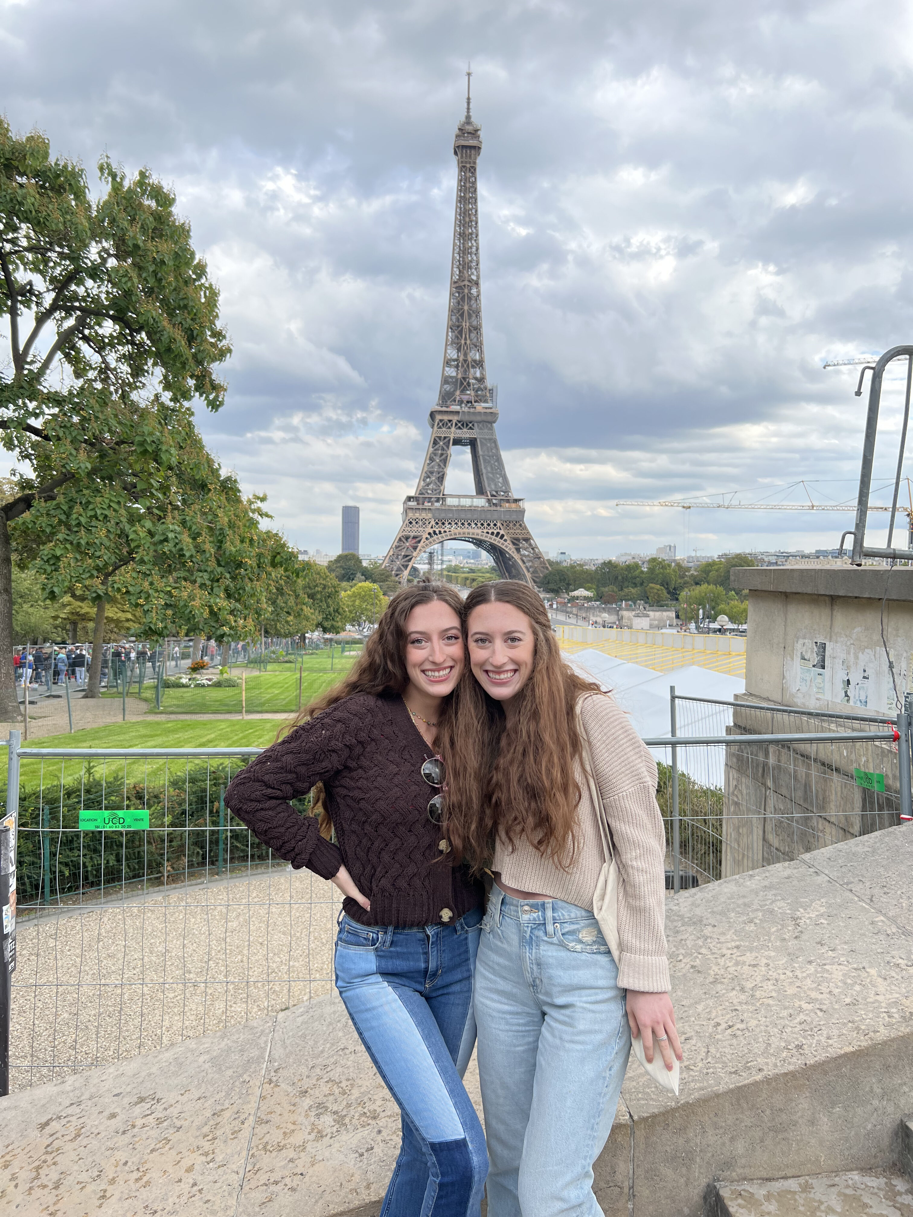 Bella and Lily at Esplanade du Trocadéro with the Eiffel Tower in the background.
