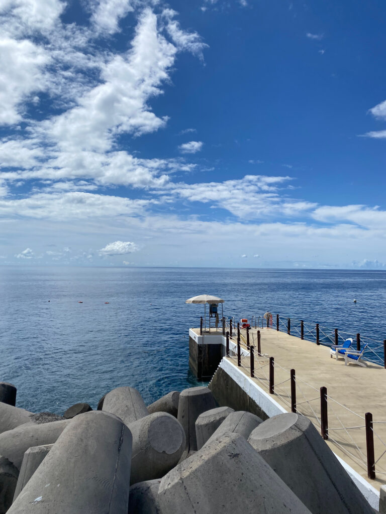 Stone dock leading to the Atlantic Ocean in Funchal, a great place to snorkel!