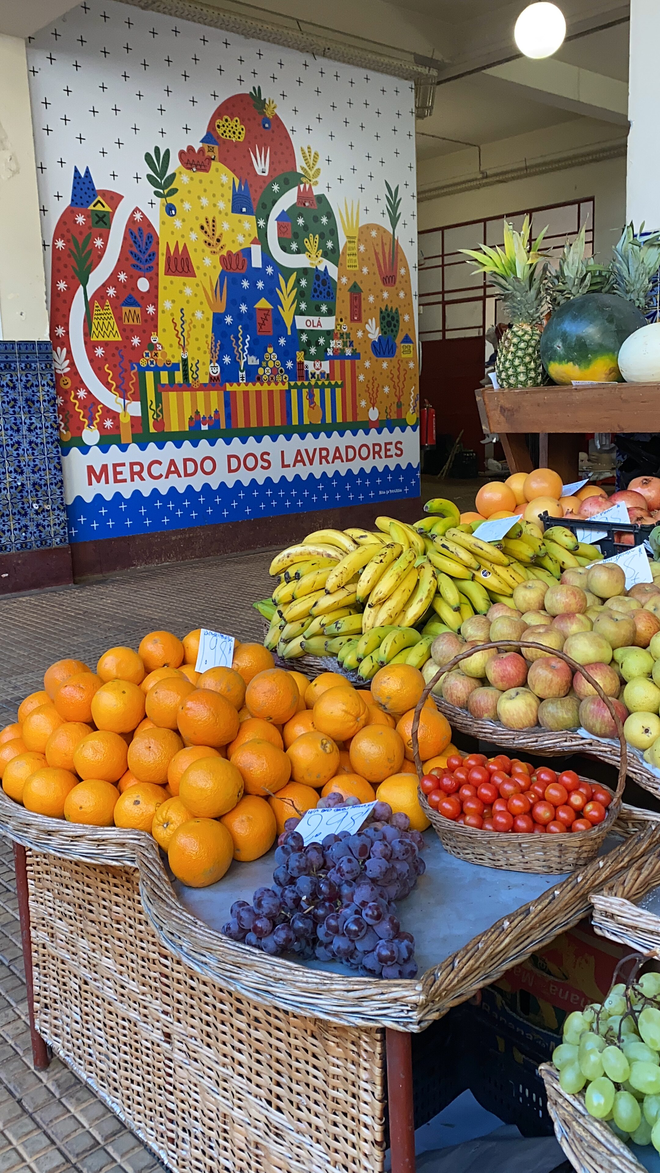 Vibrant, colorful fruits at Mercado dos Lavradores, a local farmer's market in Madeira.