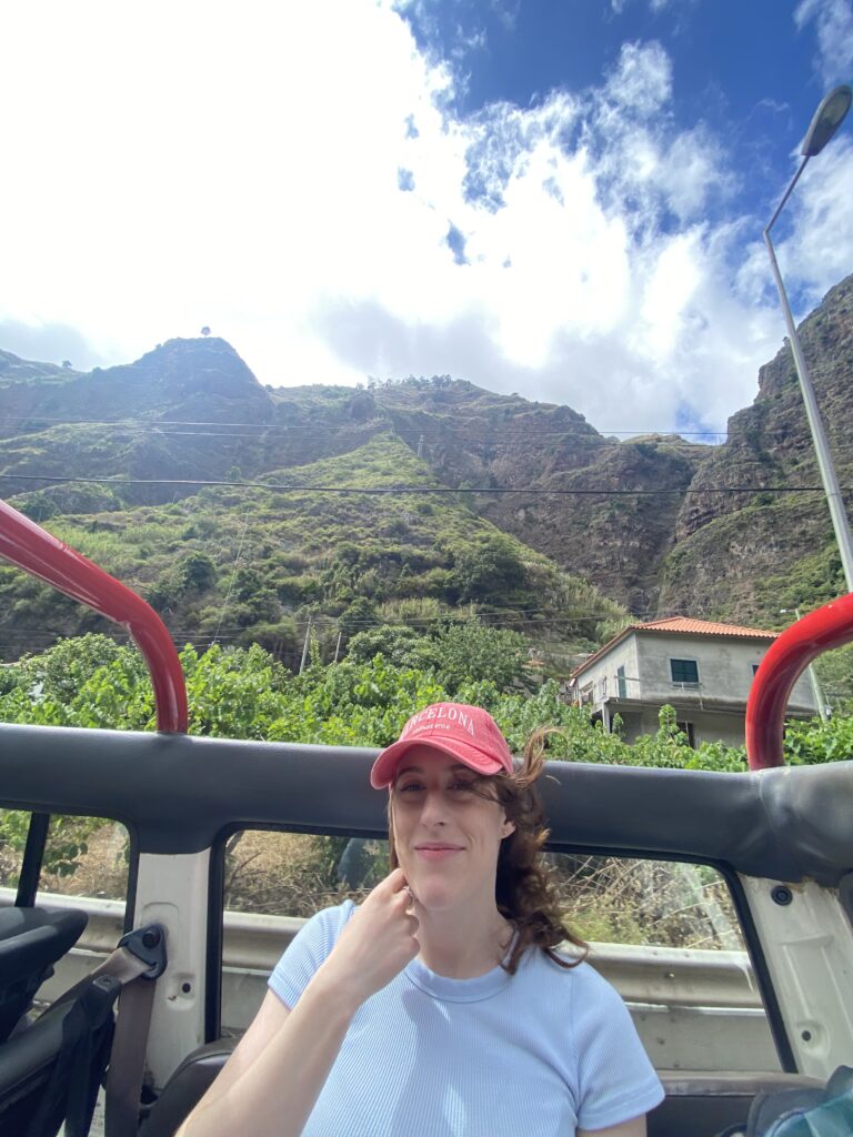 Bella in the back of the 4X4, driving along the hillside village of São Vicente.