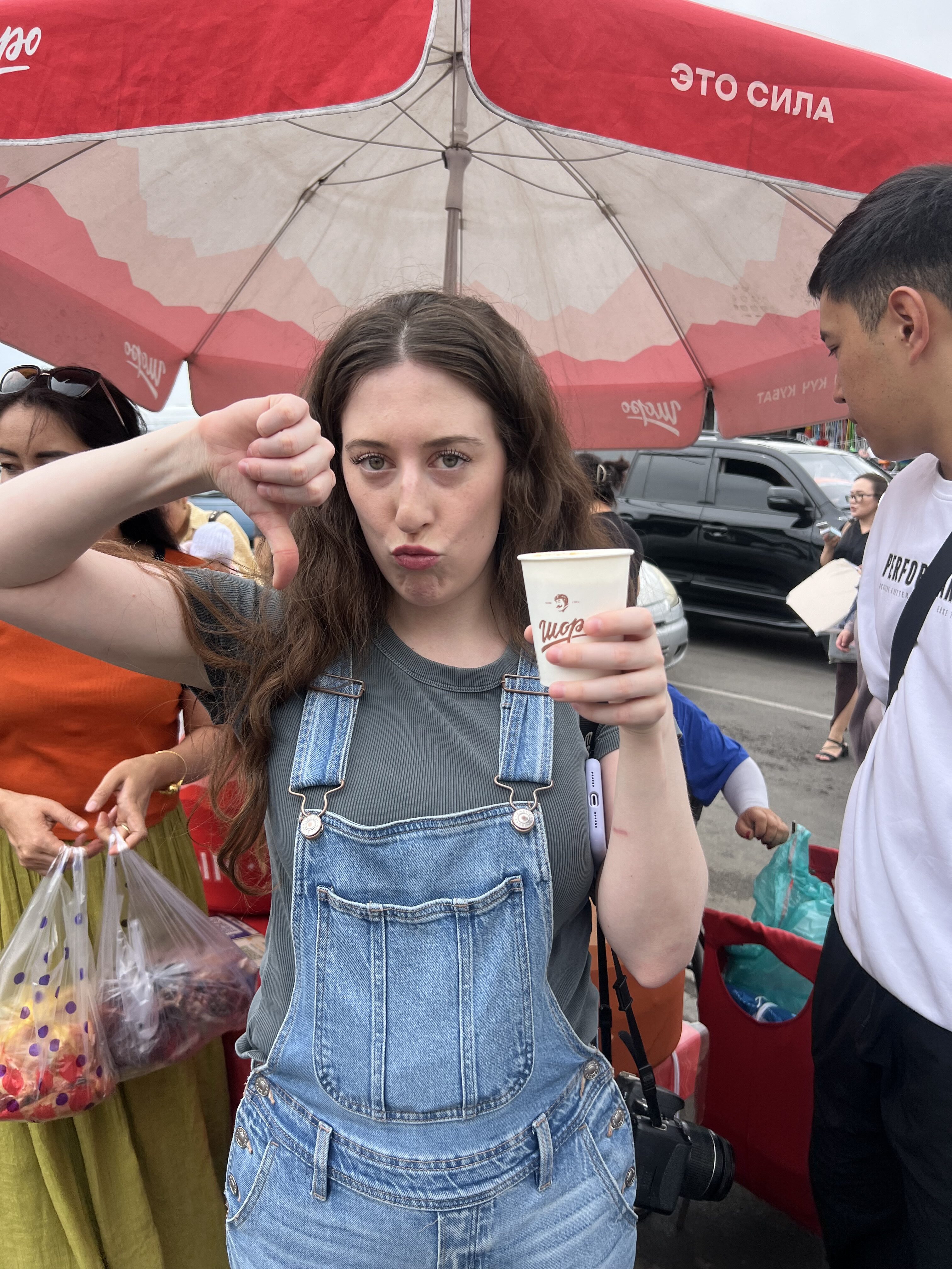 Bella, giving a thumbs down to the Aralash, a Kyrgyz street drink.