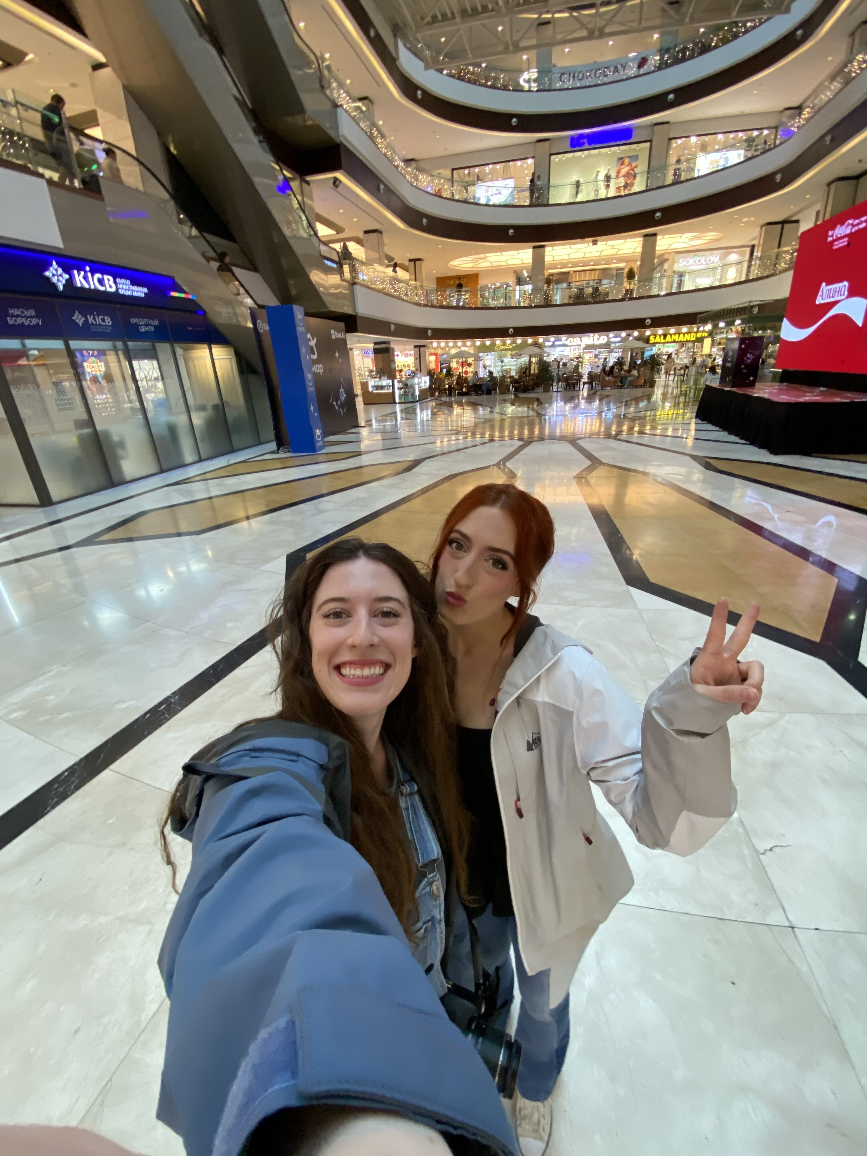 Bella and Lily pose for a selfie at Bishkek Park Mall.