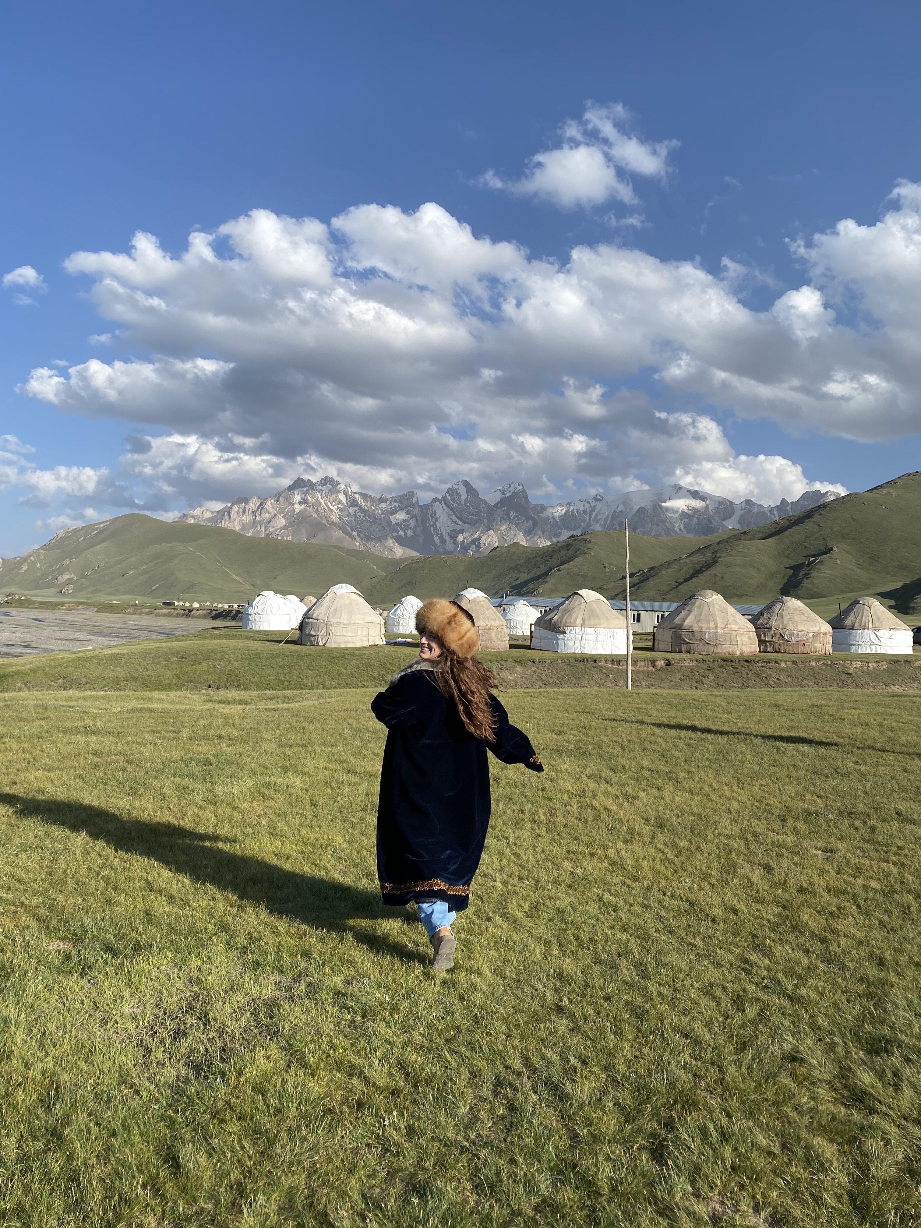 Bella frolicking in Kyrgyz clothes in the Kok Kiya valley.