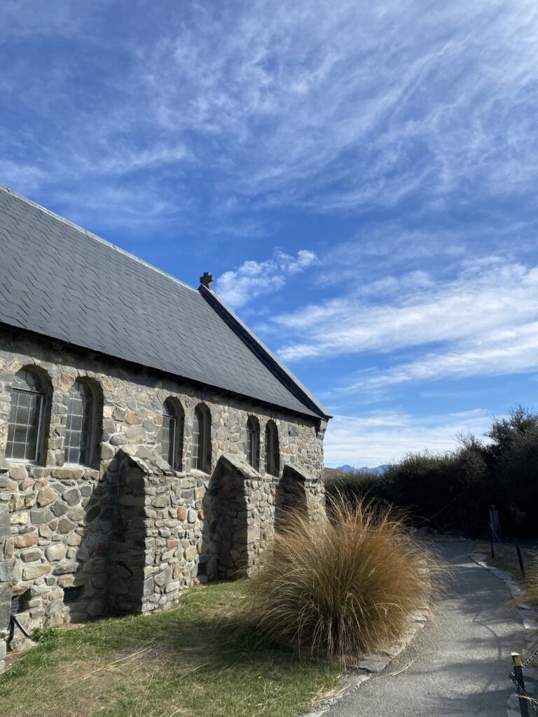A grey-brick church building in Lake Tekapo.