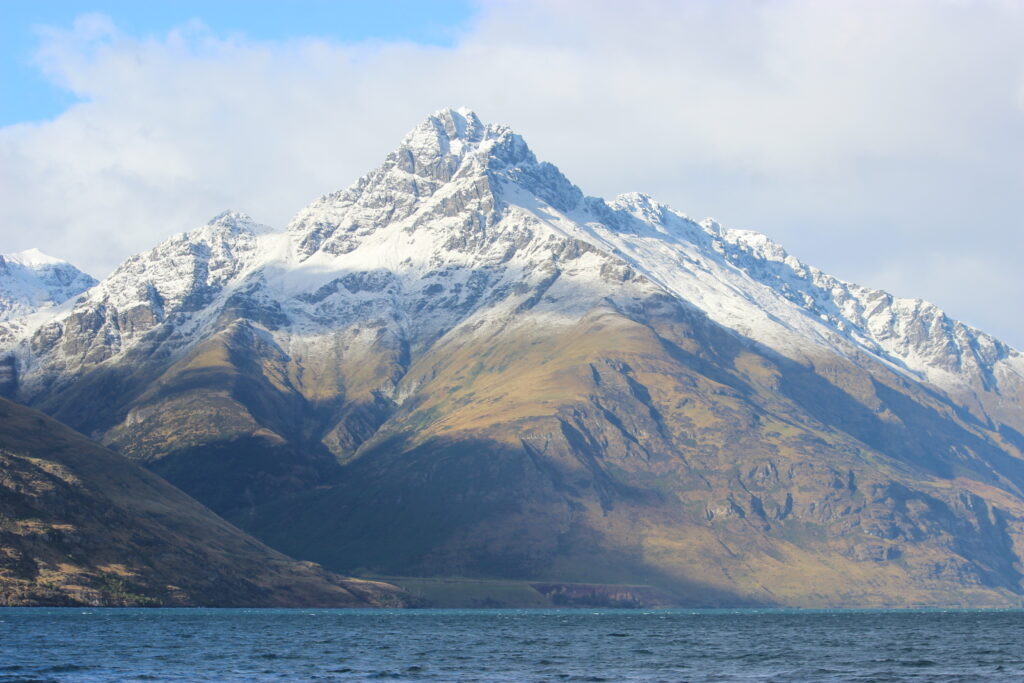 The beautiful snow-capped Walter Peak standing tall over Lake Wakatipu in Queenstown.
