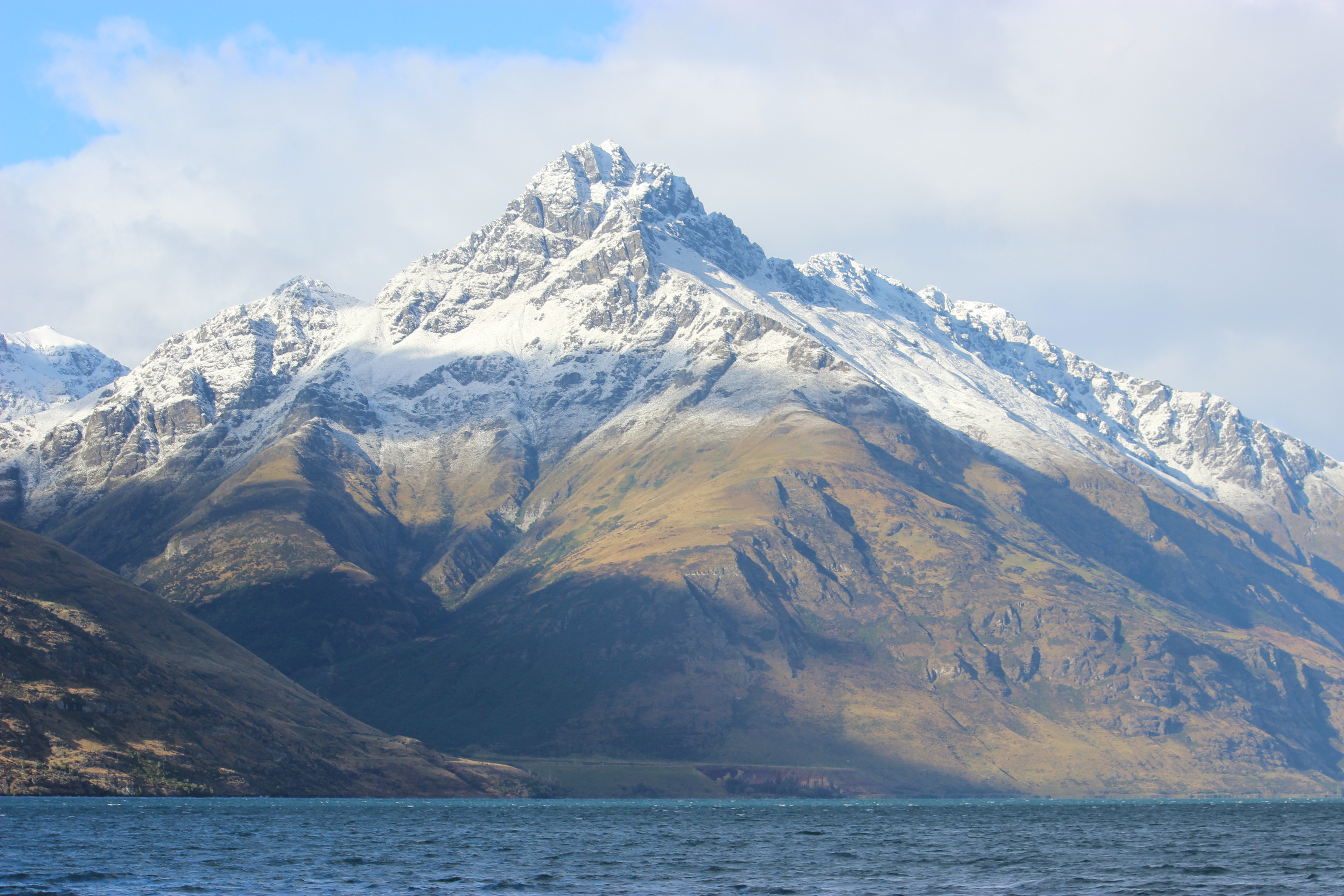 The beautiful snow-capped Walter Peak standing tall over Lake Wakatipu in Queenstown.