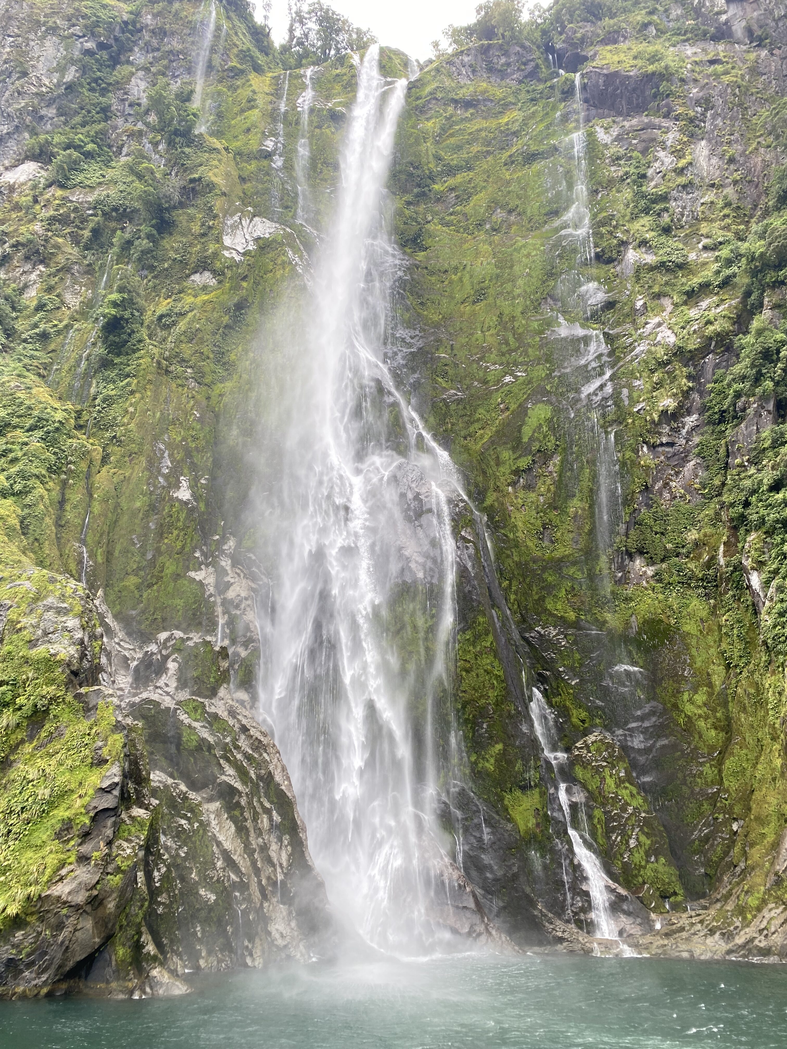 A scenic waterfall at Milford Sound.