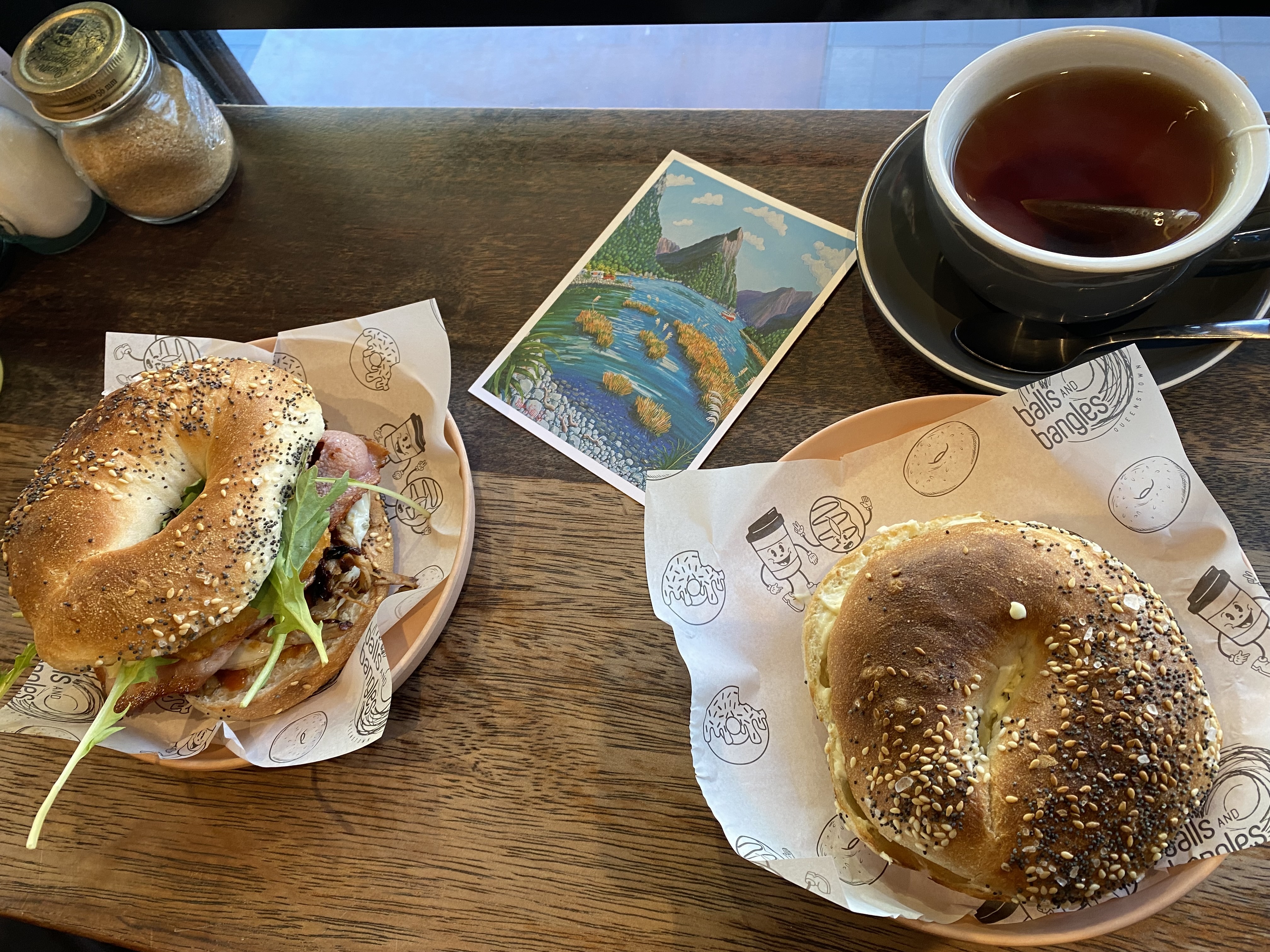Two bagel sandwiches and a cup of tea from Balls and Bangles in Queenstown.
