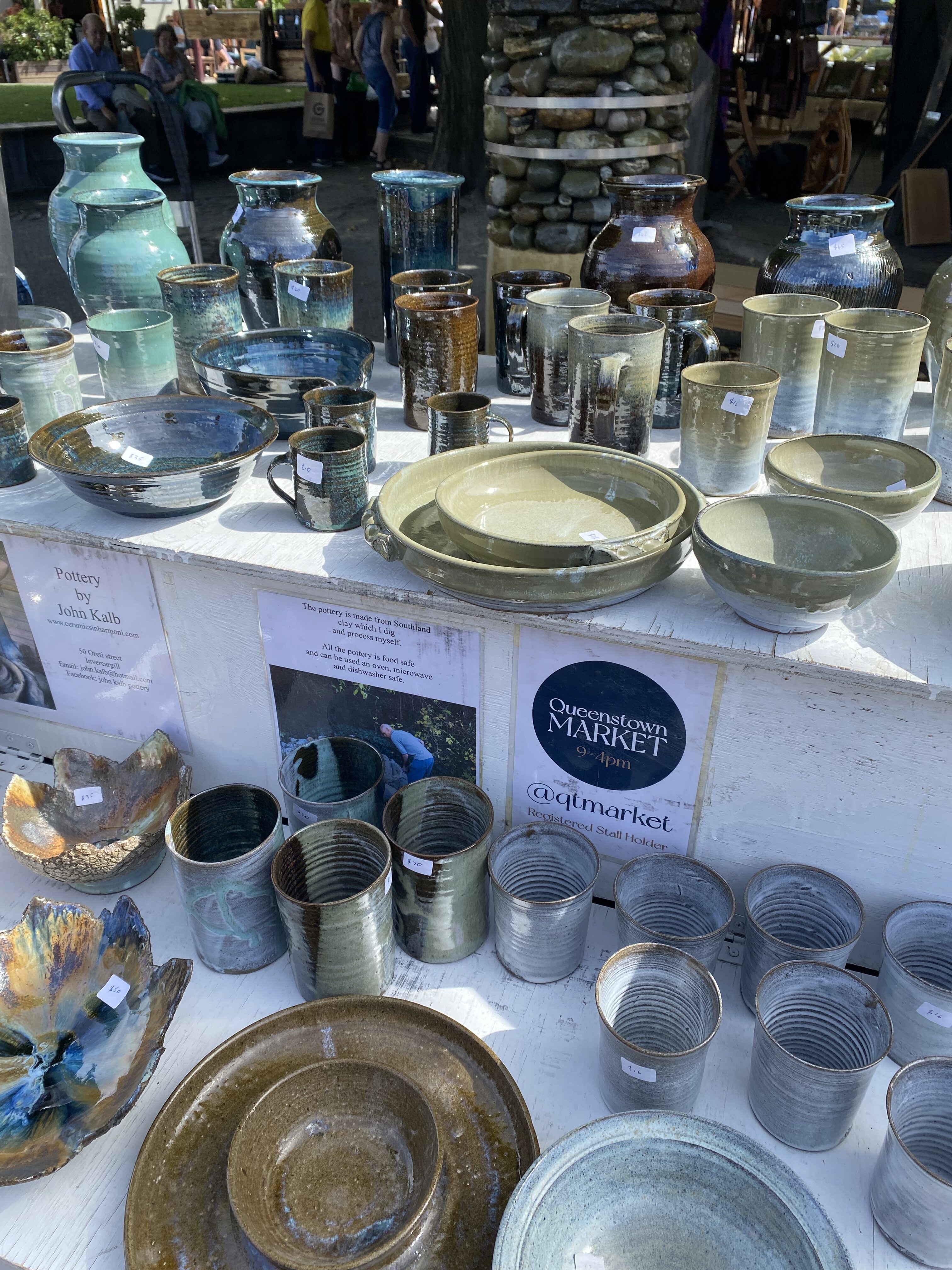 Colorful handmade ceramics at a local market in Queenstown.