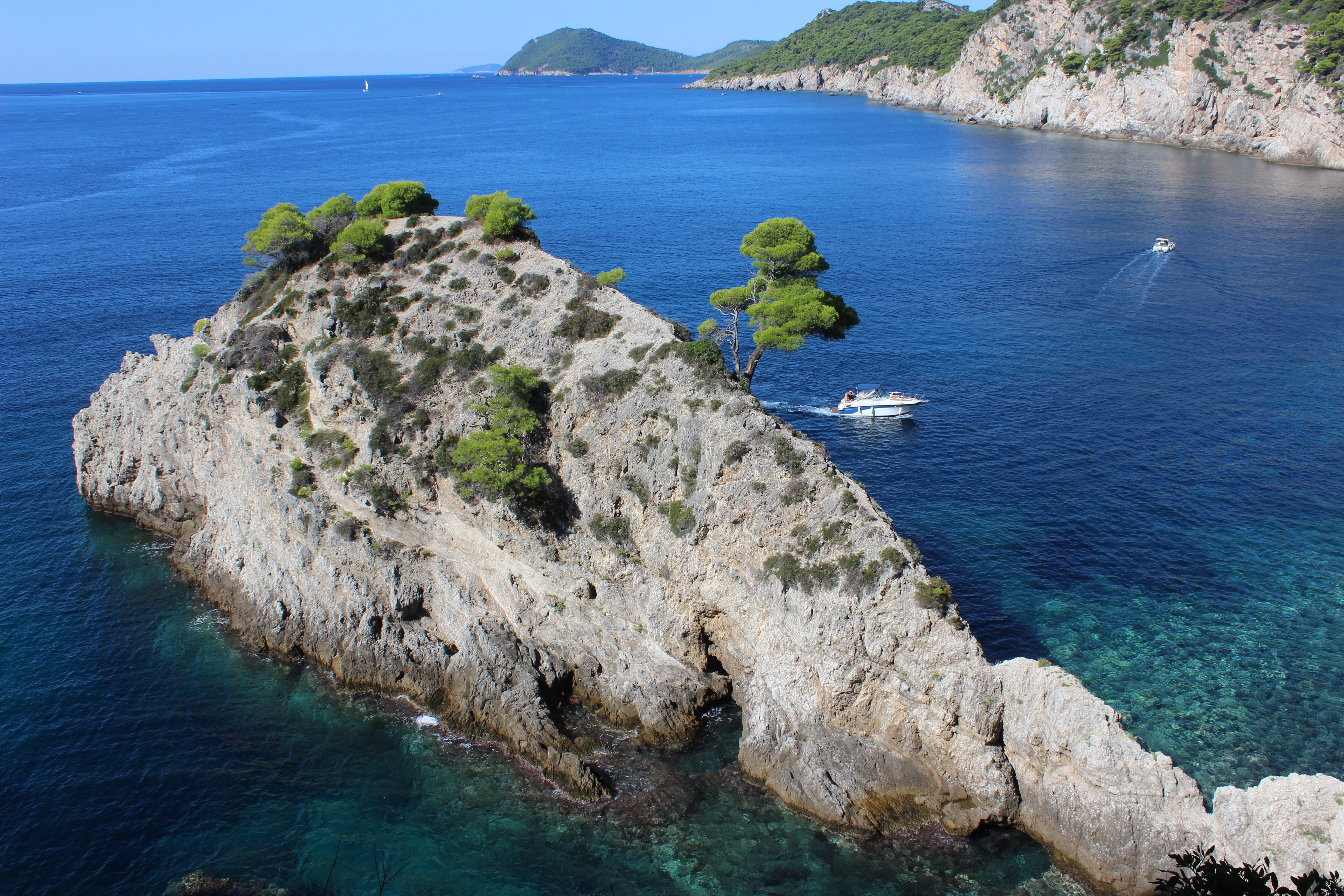A rocky peninsula surrounded by sapphire water of the Adriatic Sea at Koločep Island (Elaphiti).