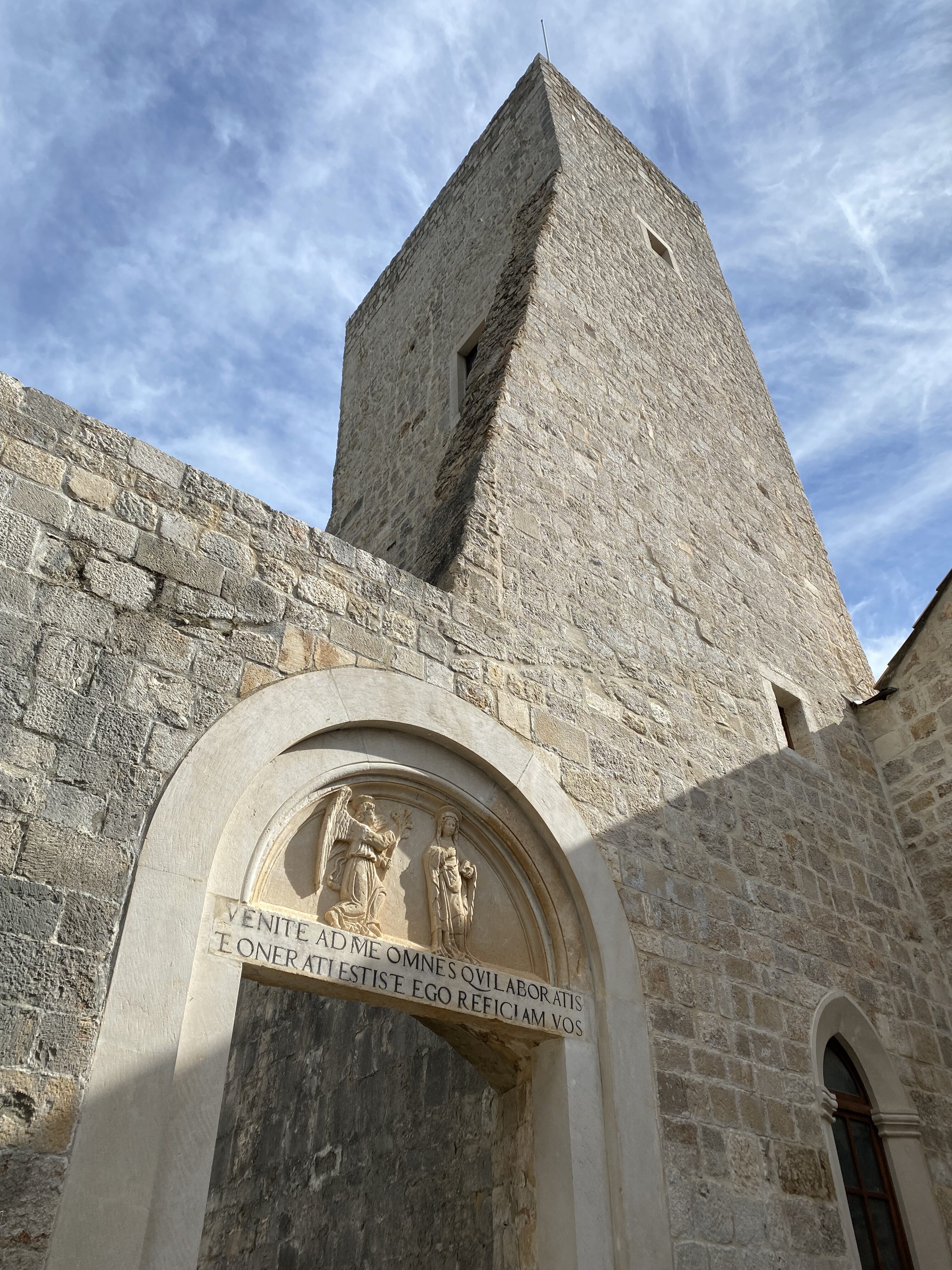 Weathered stone wall of the Benedictine Monastery on Lokrum Island.