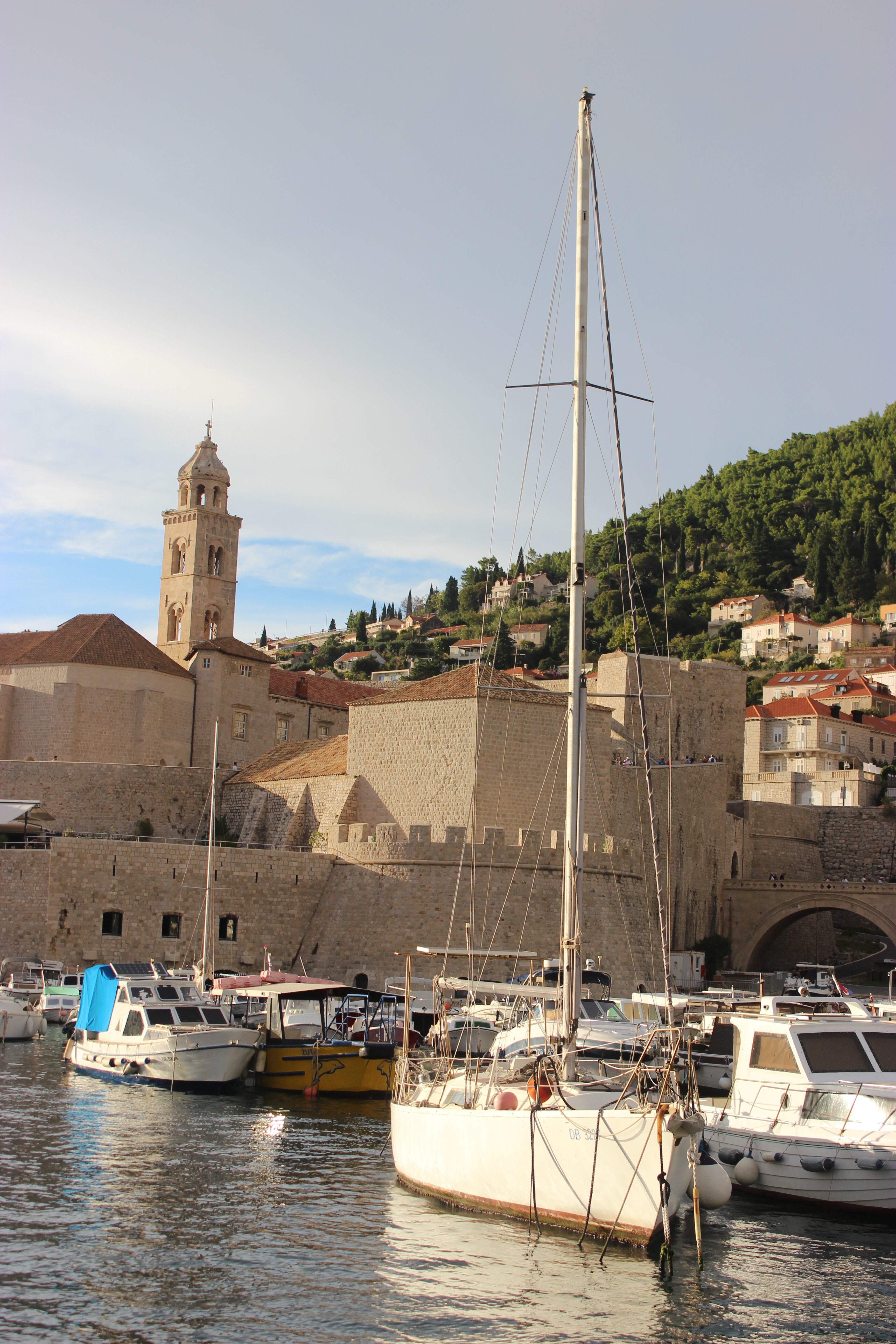 A sailboat in Dubrovnik Old Town Harbor.