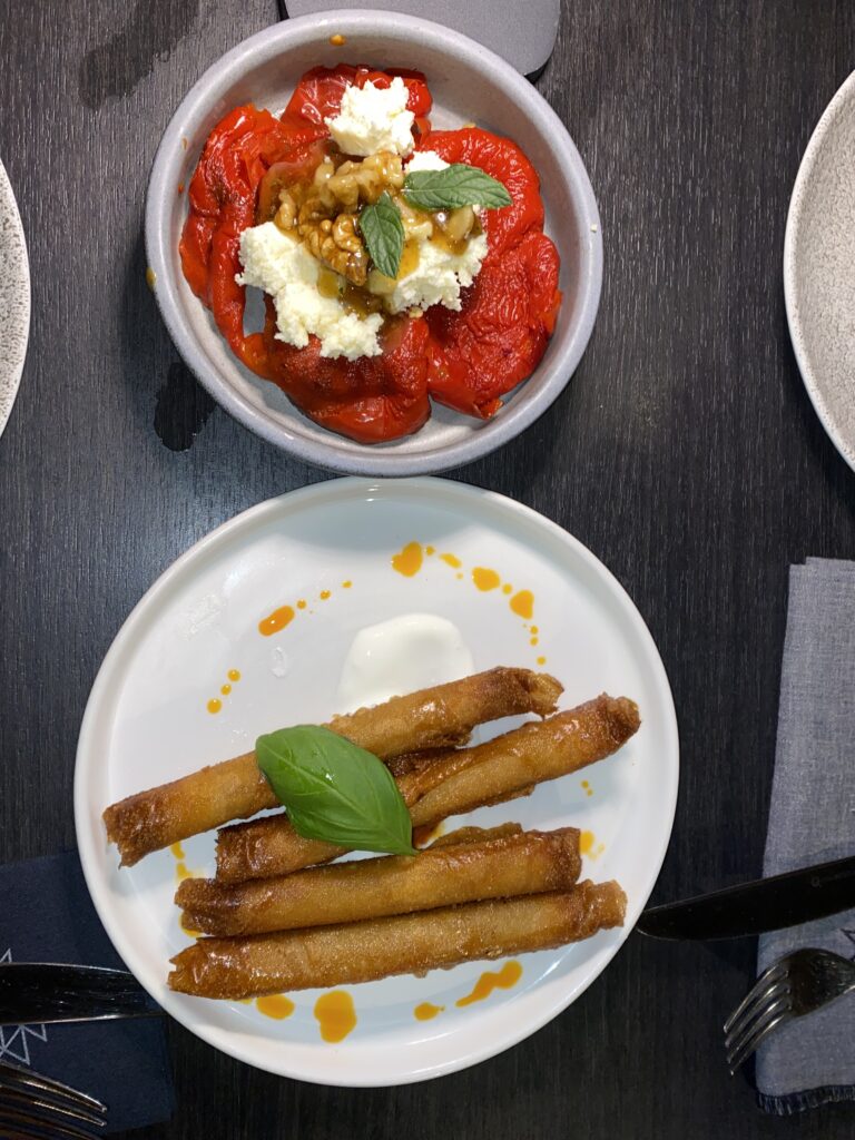 Roasted peppers with kajmak and cigar-shaped meat filled pastries from Taj Mahal Dubrovnik.