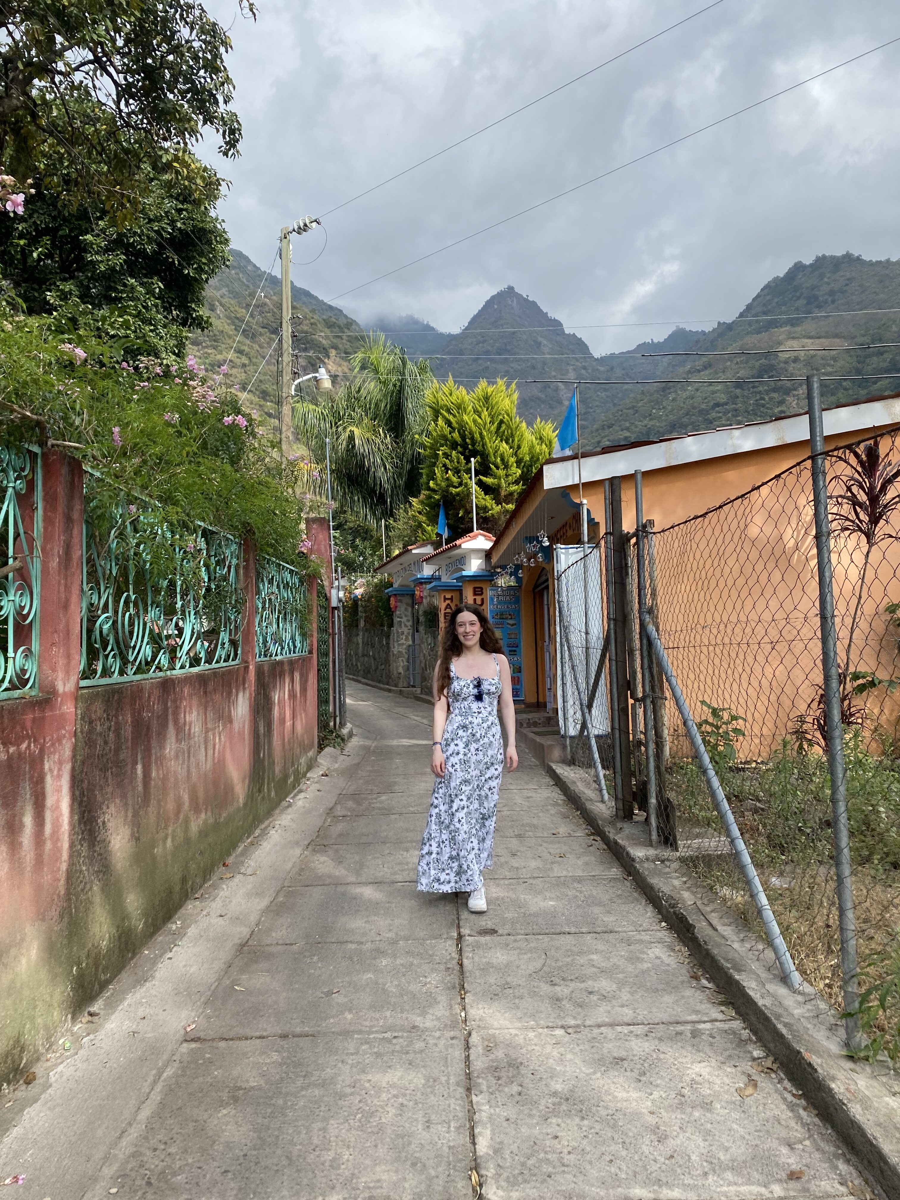Bella walking along path in Jaibalito, Lake Atitlán.