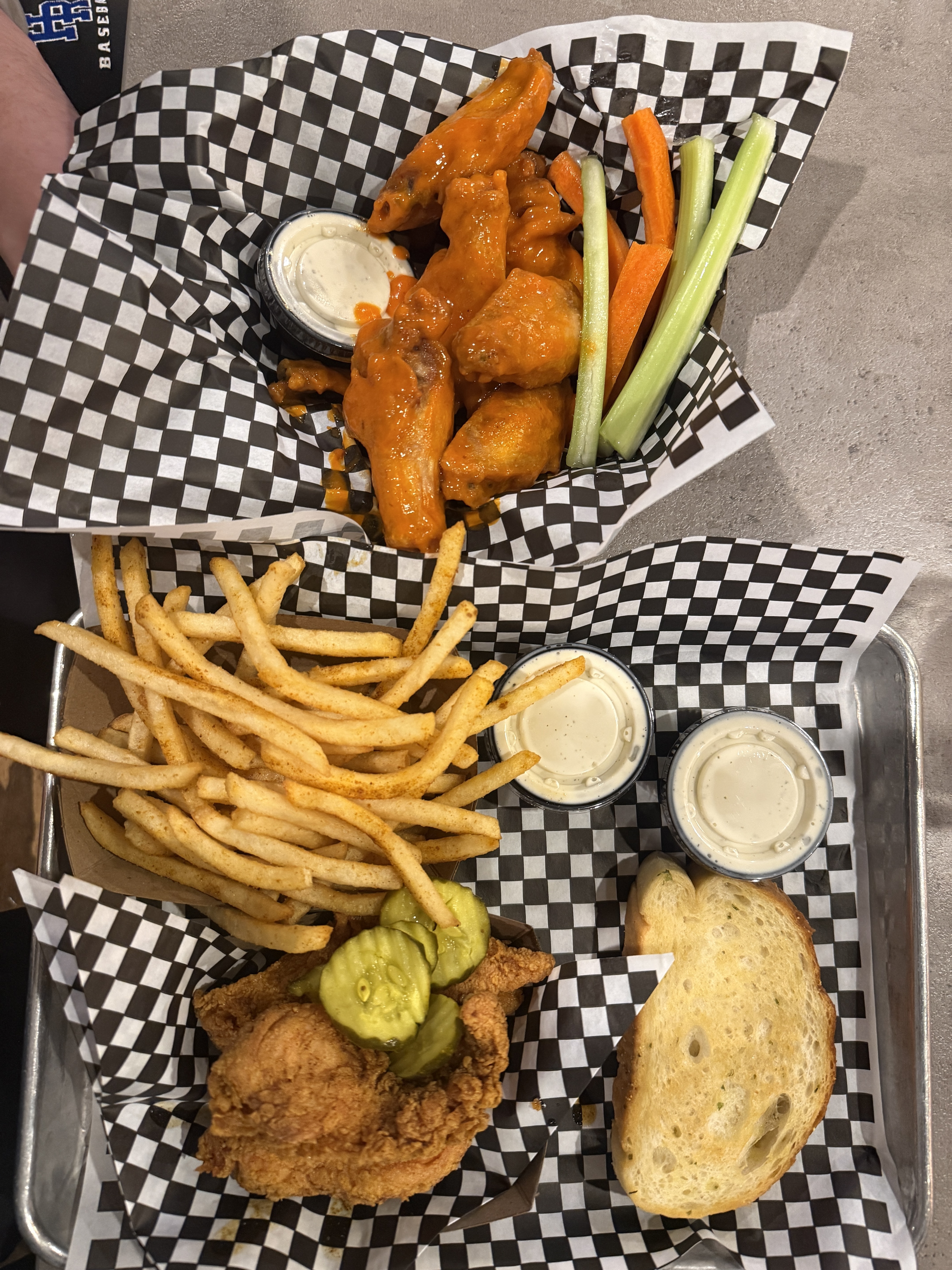 A basket of buffalo wings and spicy chicken tenders with fries at Hypnotic Chicken in Steamboat.