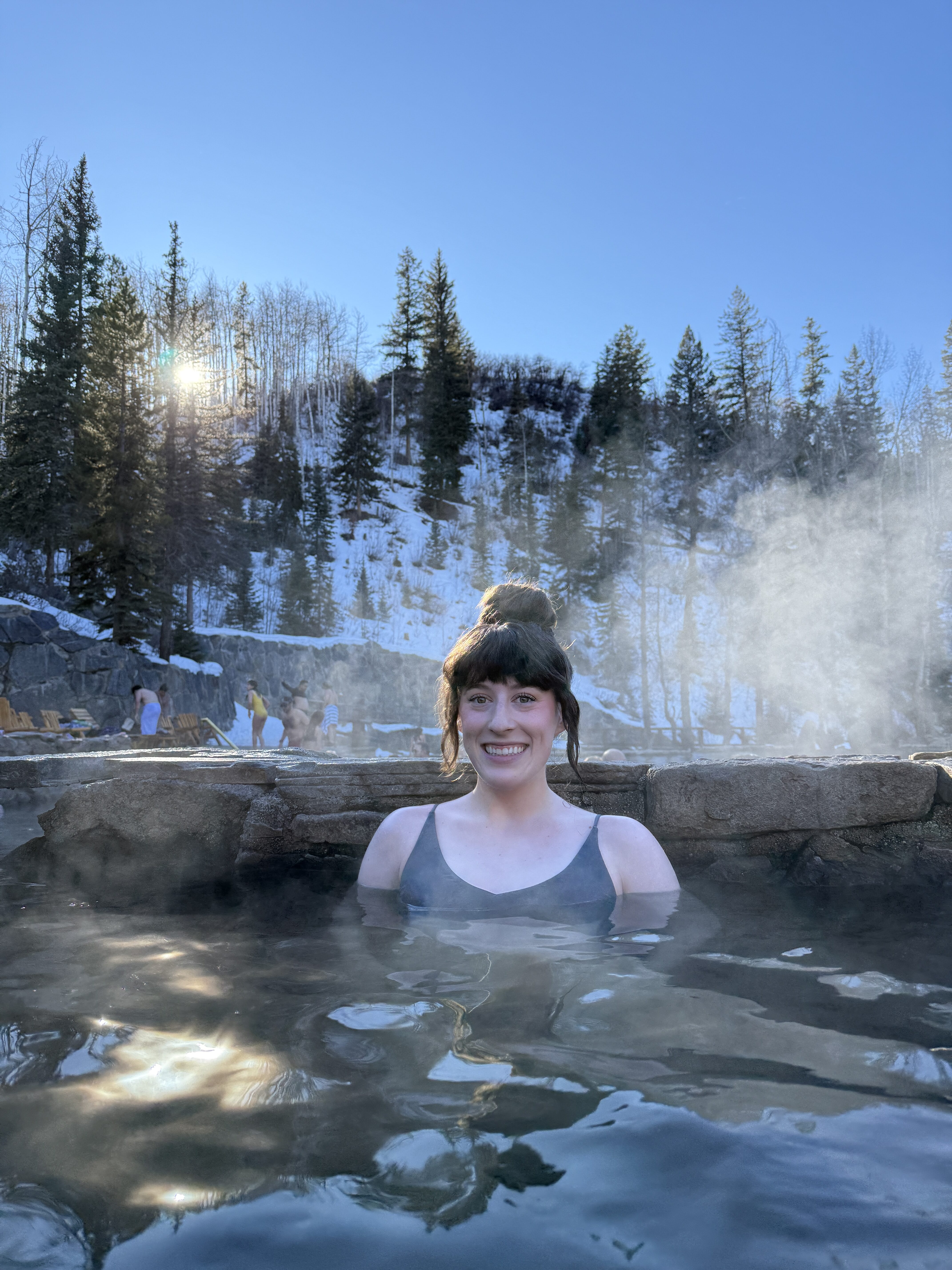 Bella smiling at Strawberry Park Hot Springs in Steamboat Springs, Colorado.