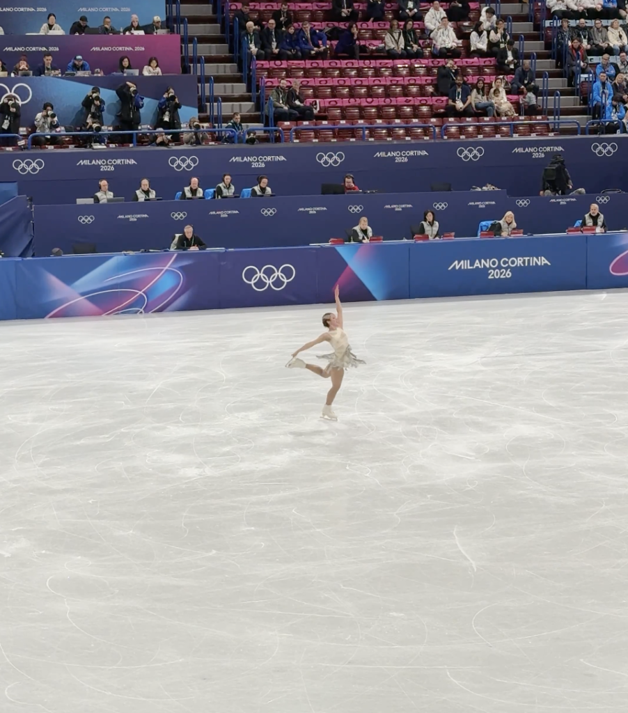 Alysa Liu spinning on her skates at the 2026 Milano-Cortina Winter Olympics.