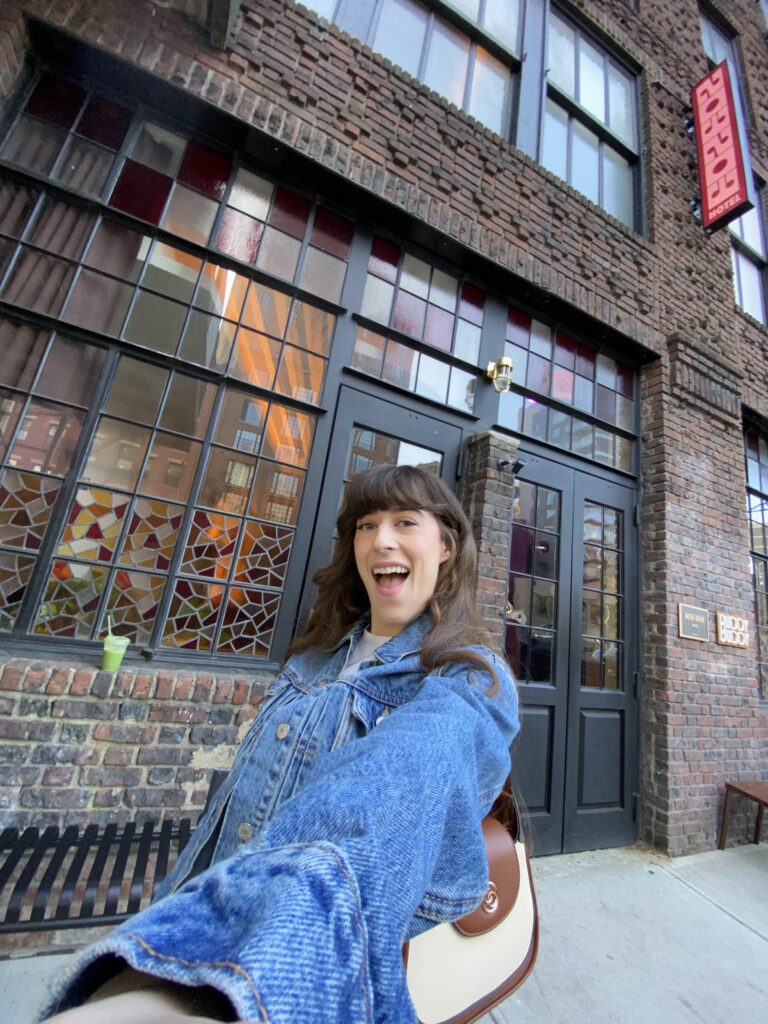 Bella posing in front of Now Now hotel in NoHo.