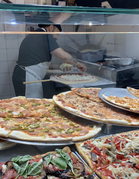 Pizza on display at Carnegie Pizza in Times Square, NYC.