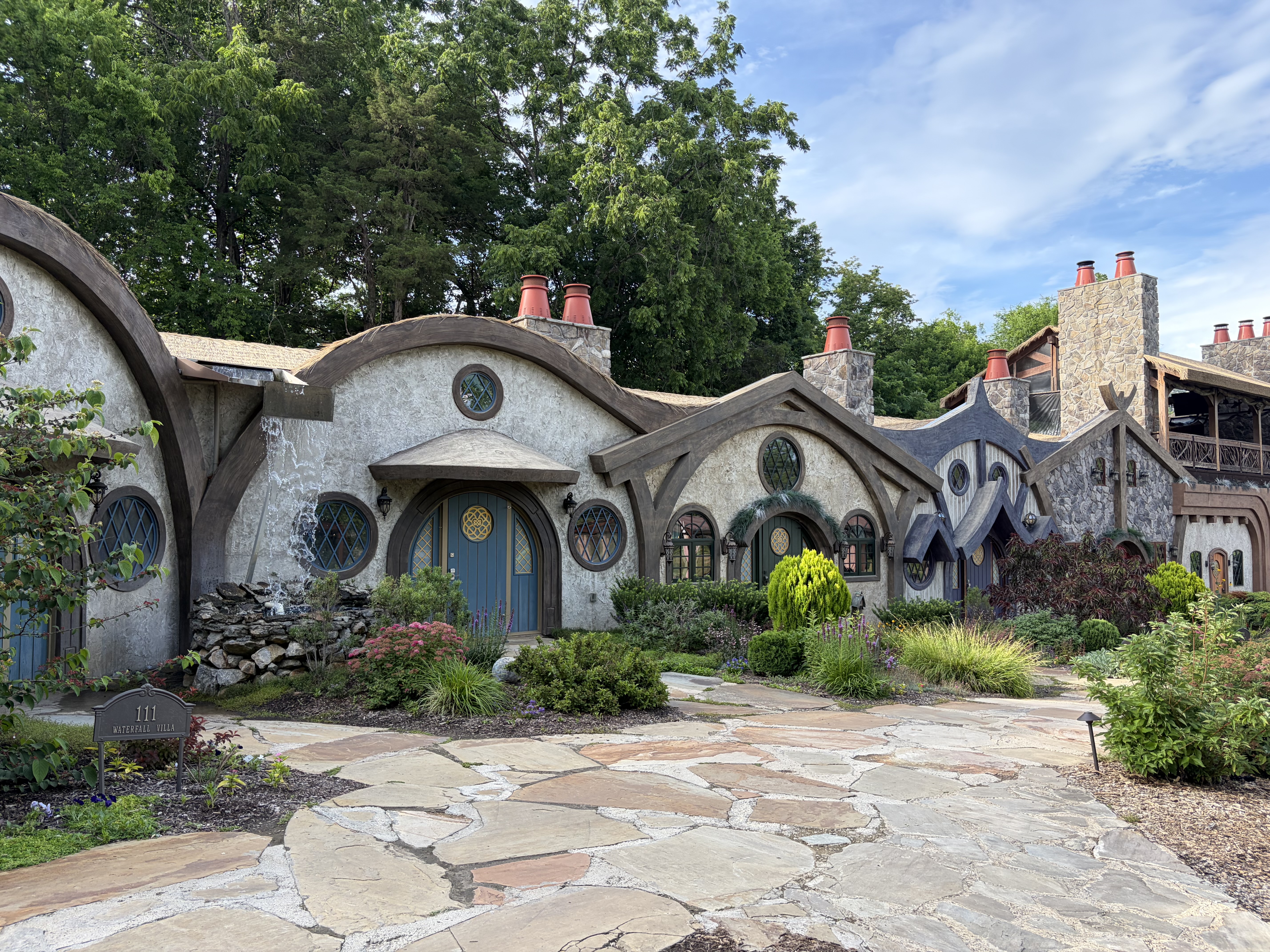 The fairytale-like collection of round bungalows, each with different features and colorful doors, at the Ancient Lore Village.